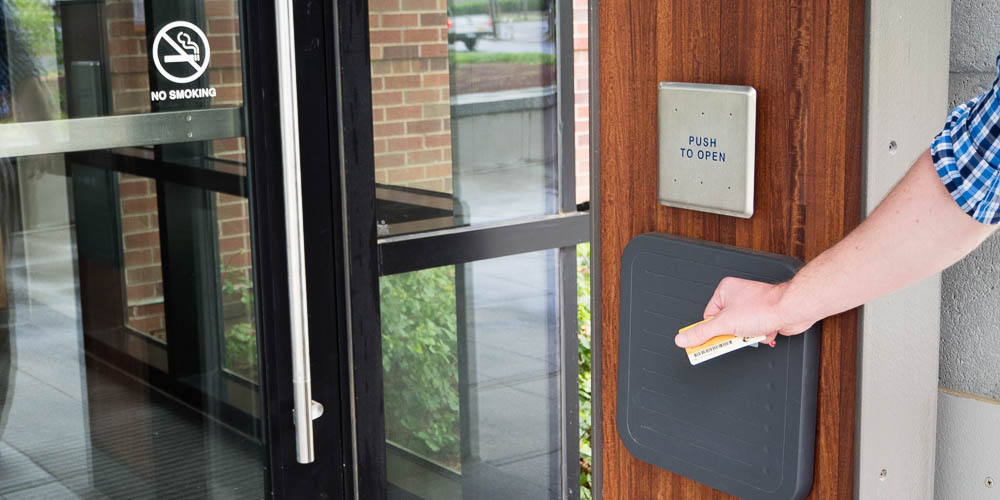 swiping card to access building